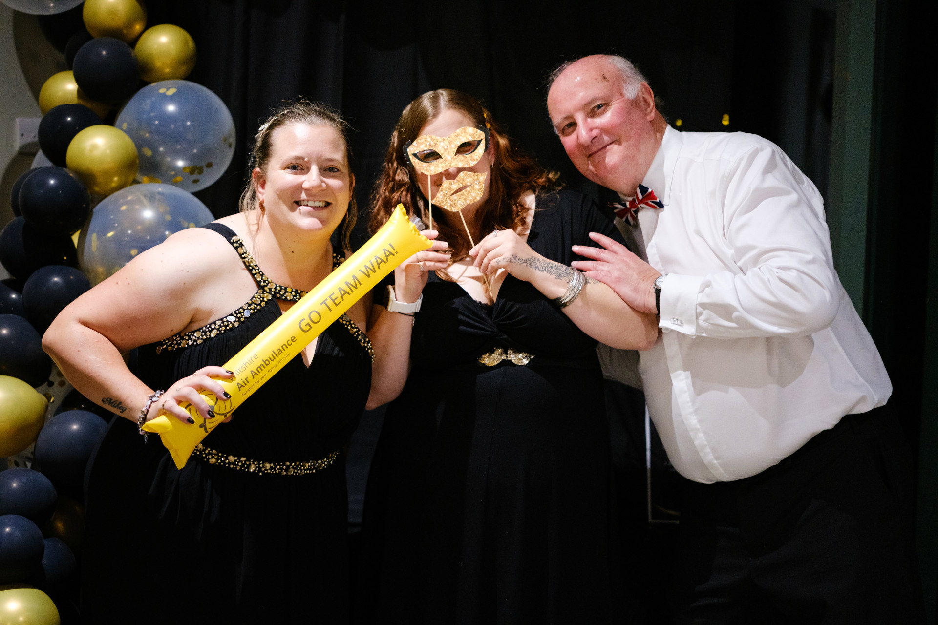 WAA ambassador Alan Dedicoat and charity ball attendees posing for a photo WAA ambassador Alan Dedicoat and charity ball attendees posing for a photo