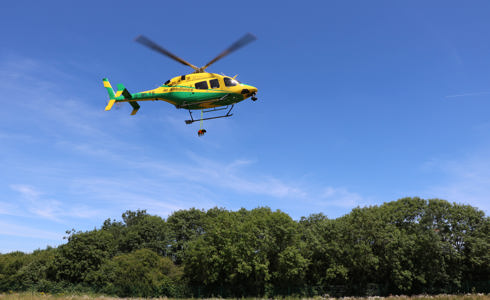 A photoshopped Dachshund dangling from the Wiltshire AIr Ambulance helicopter A photoshopped Dachshund dangling from the Wiltshire AIr Ambulance helicopter