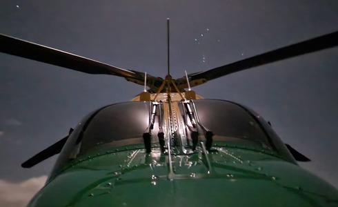 Front view of the WAA helicopter at night with stars in the background Front view of the WAA helicopter at night with stars in the background